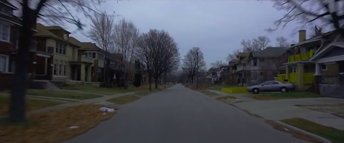 Down a narrow straight street